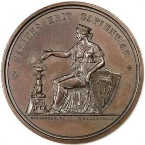 Rear of the Jesse Ketchum Medal - the latin reads "A Wise Man Will be Wiser"
